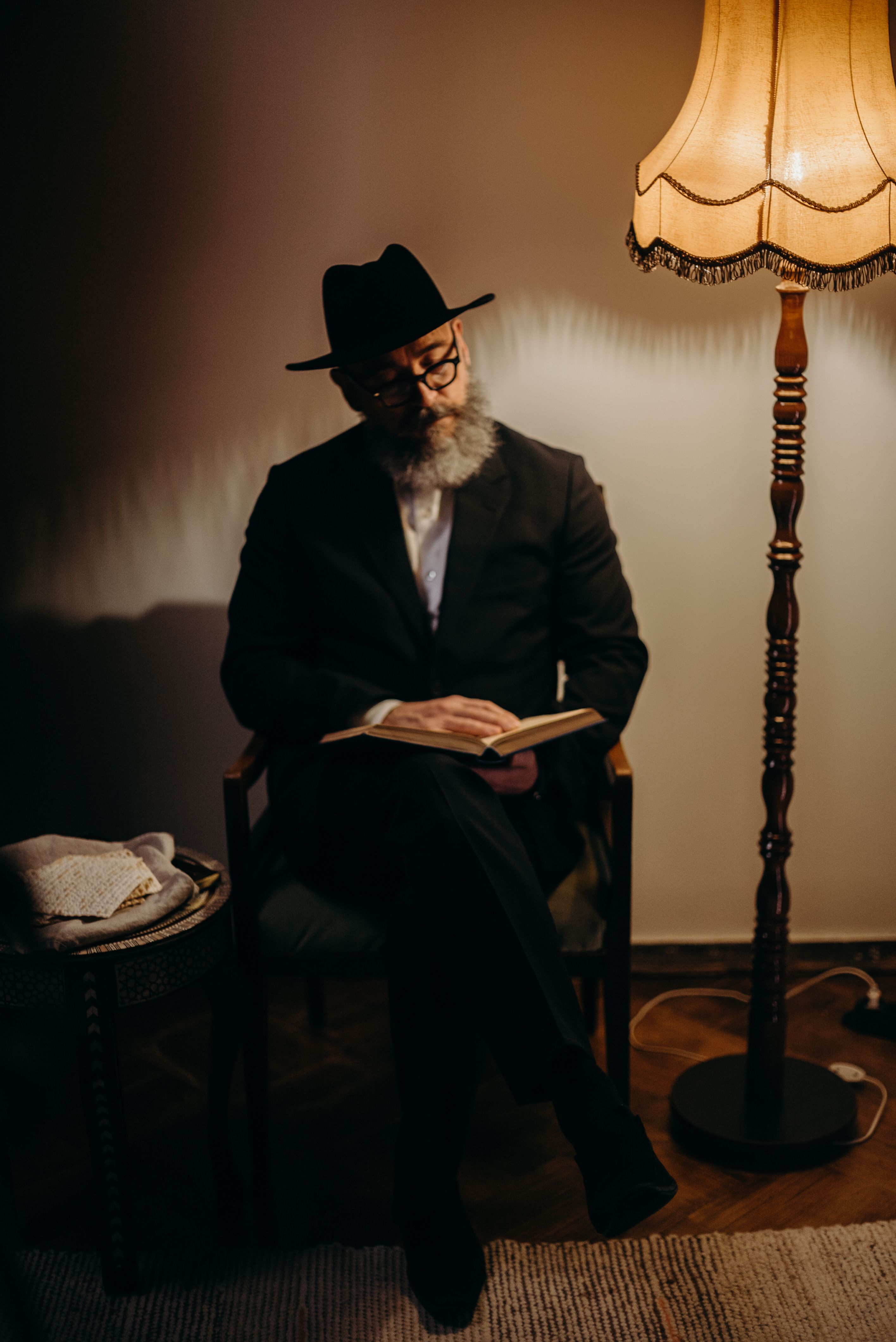 Hero image: Rabbi reading Hebrew